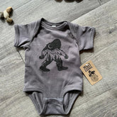 West Coast Karma Baby Onesie - Charcoal Nature Sasquatch