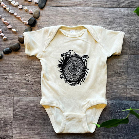 West Coast Karma Baby Onesie - Oatmeal Mushroom Tree Ring